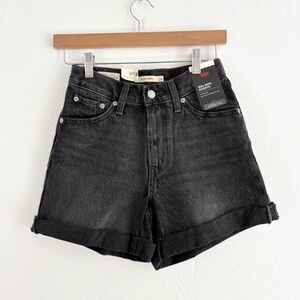 Black wash denim “80s mom shorts” by Levi’s